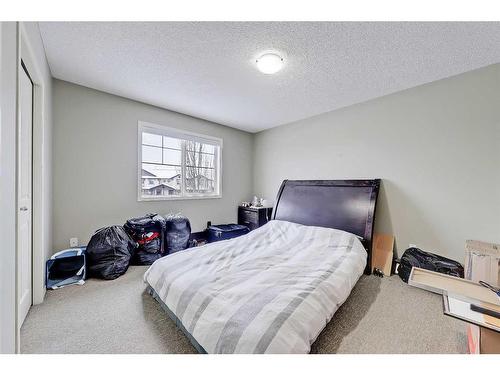 75-105 Drake Landing Common, Okotoks, AB - Indoor Photo Showing Bedroom