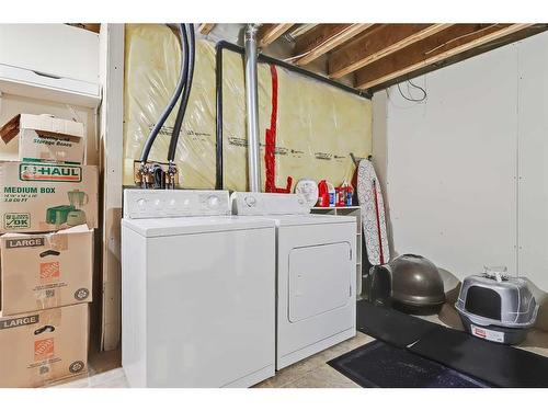 75-105 Drake Landing Common, Okotoks, AB - Indoor Photo Showing Laundry Room