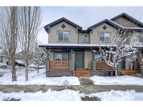 75-105 Drake Landing Common, Okotoks, AB - Outdoor With Deck Patio Veranda With Facade