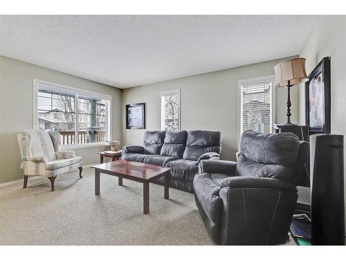 75-105 Drake Landing Common, Okotoks, AB - Indoor Photo Showing Living Room