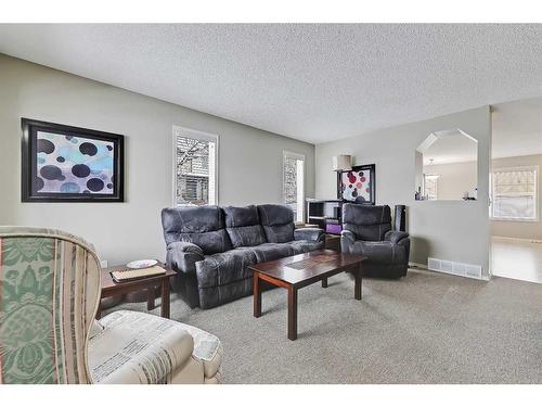 75-105 Drake Landing Common, Okotoks, AB - Indoor Photo Showing Living Room