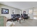 75-105 Drake Landing Common, Okotoks, AB  - Indoor Photo Showing Living Room 