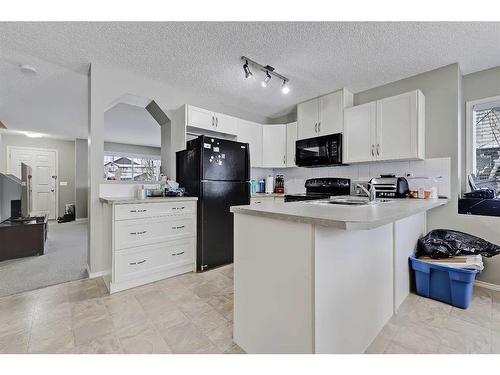 75-105 Drake Landing Common, Okotoks, AB - Indoor Photo Showing Kitchen