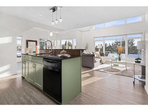 305-141 Mountain Street, Cochrane, AB - Indoor Photo Showing Kitchen