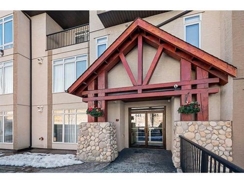 305-141 Mountain Street, Cochrane, AB - Outdoor With Balcony