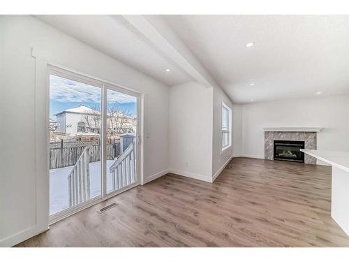 80 Saddleback Way Ne, Calgary, AB - Indoor Photo Showing Other Room With Fireplace