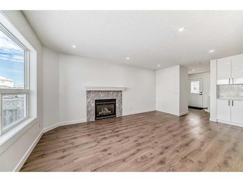 80 Saddleback Way Ne, Calgary, AB - Indoor Photo Showing Living Room With Fireplace