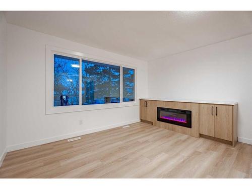 115 Pinecrest Crescent Ne, Calgary, AB - Indoor With Fireplace