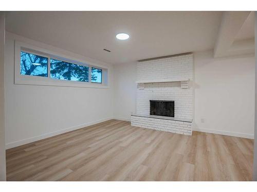 115 Pinecrest Crescent Ne, Calgary, AB - Indoor With Fireplace