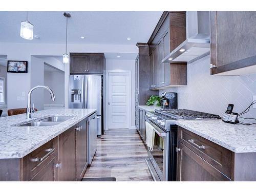 126 Saddlestone Park Ne, Calgary, AB - Indoor Photo Showing Kitchen With Double Sink With Upgraded Kitchen