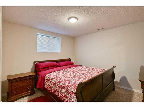 12 Hidden Creek Drive Nw, Calgary, AB - Indoor Photo Showing Bedroom