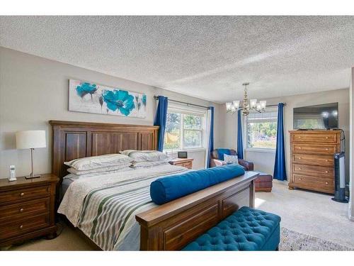 12 Hidden Creek Drive Nw, Calgary, AB - Indoor Photo Showing Bedroom