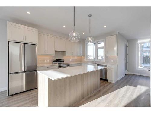 303-85 Sage Hill Heights, Calgary, AB - Indoor Photo Showing Kitchen With Stainless Steel Kitchen With Upgraded Kitchen