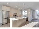 303-85 Sage Hill Heights, Calgary, AB  - Indoor Photo Showing Kitchen With Stainless Steel Kitchen With Upgraded Kitchen 