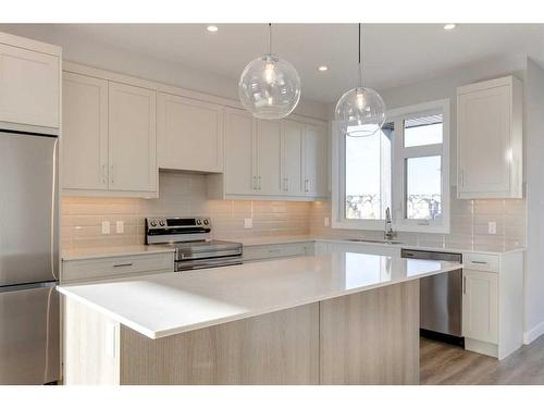 303-85 Sage Hill Heights, Calgary, AB - Indoor Photo Showing Kitchen With Stainless Steel Kitchen With Upgraded Kitchen