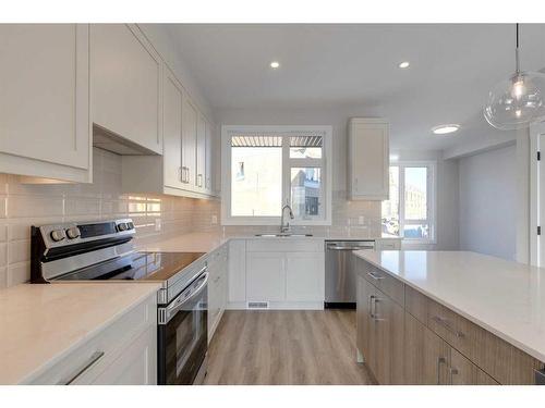 303-85 Sage Hill Heights, Calgary, AB - Indoor Photo Showing Kitchen With Stainless Steel Kitchen With Upgraded Kitchen