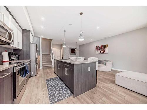 1-1714 Kensington Road Nw, Calgary, AB - Indoor Photo Showing Kitchen With Upgraded Kitchen