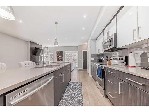 1-1714 Kensington Road Nw, Calgary, AB - Indoor Photo Showing Kitchen With Upgraded Kitchen