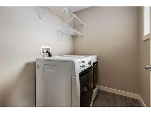 140 Walden Rise Se, Calgary, AB - Indoor Photo Showing Laundry Room