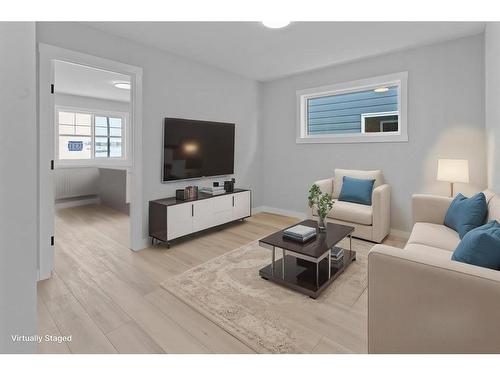 531 Rowmont Boulevard Nw, Calgary, AB - Indoor Photo Showing Living Room