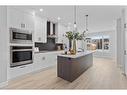 531 Rowmont Boulevard Nw, Calgary, AB  - Indoor Photo Showing Kitchen With Upgraded Kitchen 