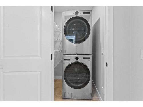 531 Rowmont Boulevard Nw, Calgary, AB - Indoor Photo Showing Laundry Room