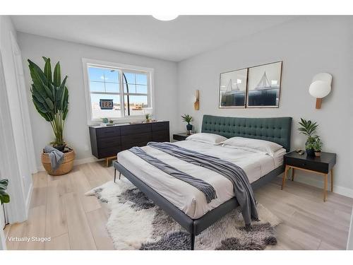 531 Rowmont Boulevard Nw, Calgary, AB - Indoor Photo Showing Bedroom