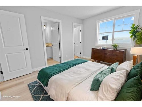 531 Rowmont Boulevard Nw, Calgary, AB - Indoor Photo Showing Bedroom