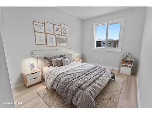 531 Rowmont Boulevard Nw, Calgary, AB - Indoor Photo Showing Bedroom