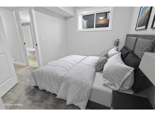 531 Rowmont Boulevard Nw, Calgary, AB - Indoor Photo Showing Bedroom