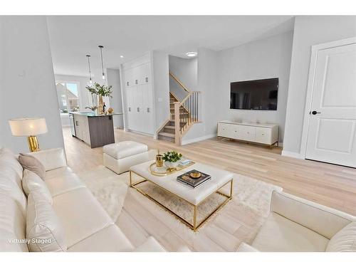 531 Rowmont Boulevard Nw, Calgary, AB - Indoor Photo Showing Living Room