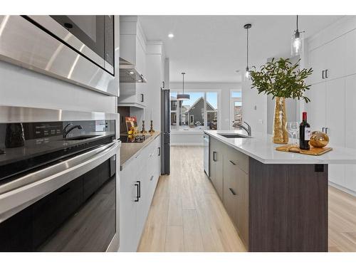 531 Rowmont Boulevard Nw, Calgary, AB - Indoor Photo Showing Kitchen With Upgraded Kitchen