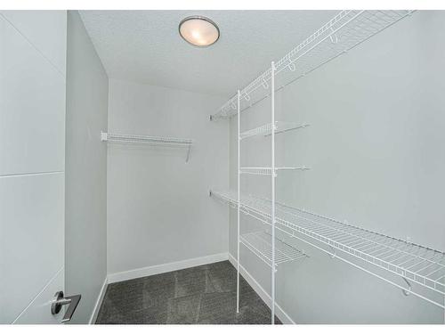 3106-95 Burma Star Road Sw, Calgary, AB - Indoor With Storage