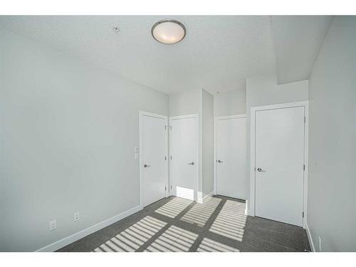 3106-95 Burma Star Road Sw, Calgary, AB - Indoor Photo Showing Other Room