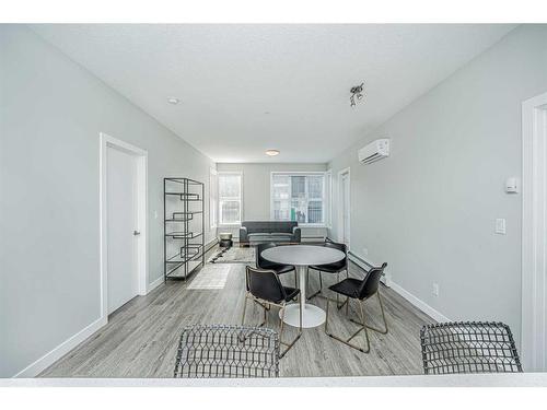 3106-95 Burma Star Road Sw, Calgary, AB - Indoor Photo Showing Dining Room