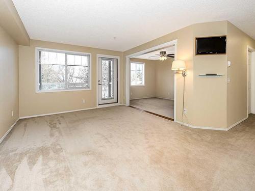 2207-200 Community, Okotoks, AB - Indoor Photo Showing Other Room