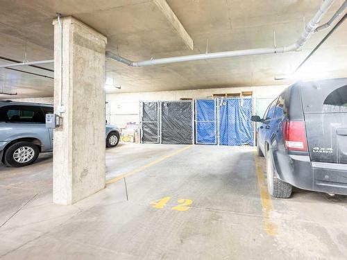 2207-200 Community, Okotoks, AB - Indoor Photo Showing Garage