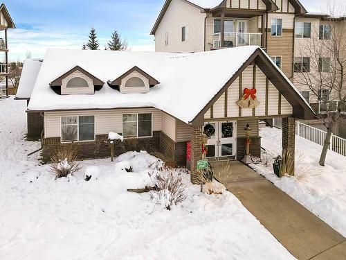 2207-200 Community, Okotoks, AB - Outdoor With Facade