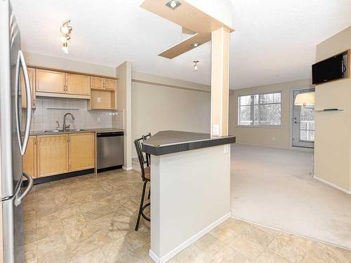 2207-200 Community, Okotoks, AB - Indoor Photo Showing Kitchen