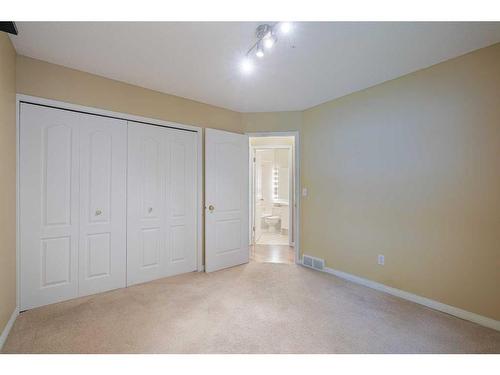 36 Sunrise Way, Priddis Greens, AB - Indoor Photo Showing Other Room