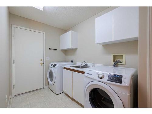 36 Sunrise Way, Priddis Greens, AB - Indoor Photo Showing Laundry Room