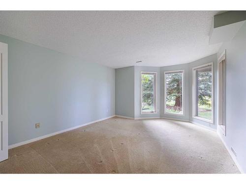 36 Sunrise Way, Priddis Greens, AB - Indoor Photo Showing Other Room