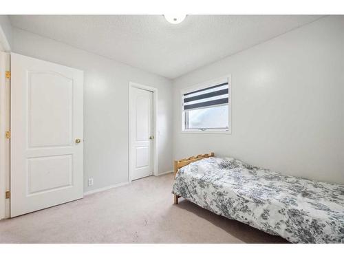 646 Sierra Morena Court Sw, Calgary, AB - Indoor Photo Showing Bedroom