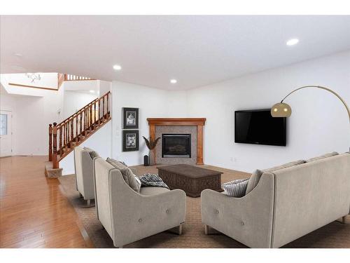 42 Royal Oak Grove Nw, Calgary, AB - Indoor Photo Showing Living Room With Fireplace