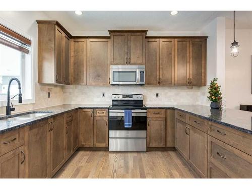 200 Heartland Way, Cochrane, AB - Indoor Photo Showing Kitchen