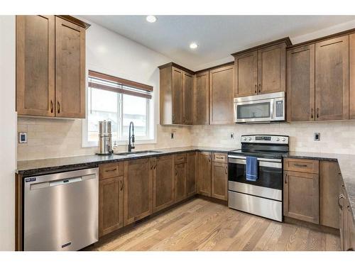 200 Heartland Way, Cochrane, AB - Indoor Photo Showing Kitchen