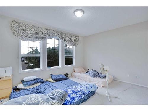 81 Taravista Way Ne, Calgary, AB - Indoor Photo Showing Bedroom