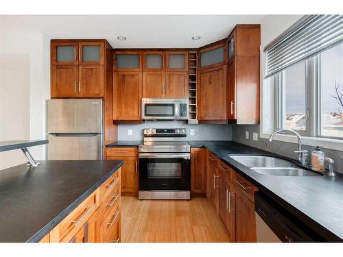 210-116 7A Street Ne, Calgary, AB - Indoor Photo Showing Kitchen With Stainless Steel Kitchen With Double Sink