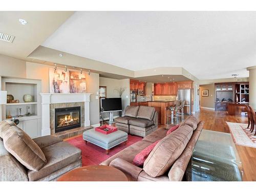 801-110 7 Street Sw, Calgary, AB - Indoor Photo Showing Living Room With Fireplace