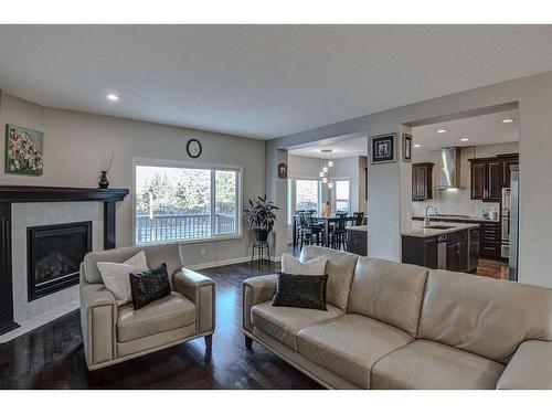 284 Everbrook Way Sw, Calgary, AB - Indoor Photo Showing Living Room With Fireplace